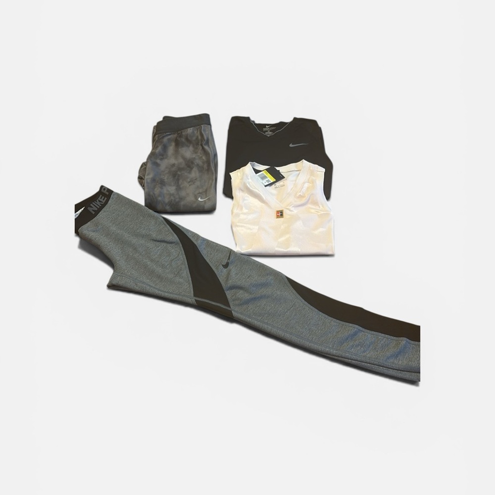 Nike Women’s 4 Piece Colorful Workout Set. The top is new with tag.